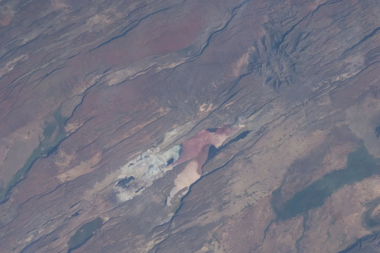 The East African Rift Valley in Kenya is featured in this image photographed by an Expedition 30 crew member on the International Space Station. This photograph highlights classical geological structures associated with a tectonic rift valley, in this case the Eastern Branch of the East African Rift near Kenya's southern border with Tanzania and just south of the Equator. The East African Rift is one of the great tectonic features of Africa, caused by fracturing of Earth's crust. The Nubian (or