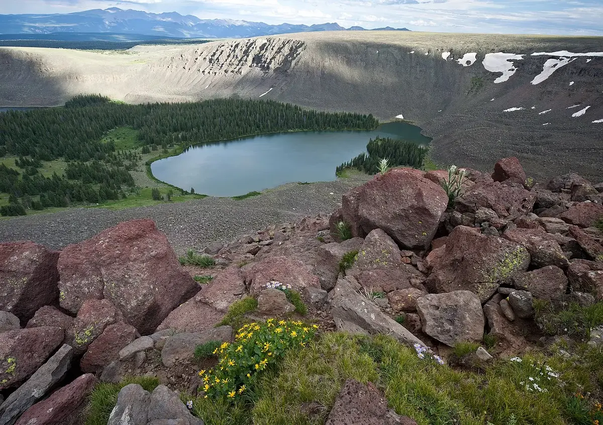The Powderhorn Wilderness in Colorado is found in a rugged, glacier-carved landscape of the northern reaches of the San Juan Mountains. The area consists of large expanses of alpine tundra, spruce forests, and several alpine lakes at nearly 12,000 feet in elevation. Breathtaking views of the San Juan Mountains are available in this wilderness. Above 12,000 feet are two high-elevation plateaus that make up the largest relatively flat expanse of alpine tundra in the lower 48 states. These plateaus