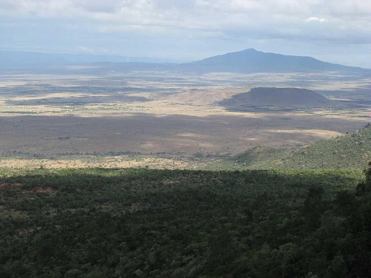 Another view of the Great Rift Valley in Kenya. The mountain at the far end is an extinct volcano (Mt. Keyna, I think? 2nd highest peak in Kenya), while the shorter one in the foreground is solidified magma from volcanos. (Oct/ Nov 2010)